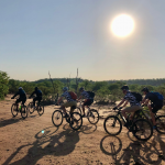 Cyclists riding through Botswana Cycle Tour | Outland Escape